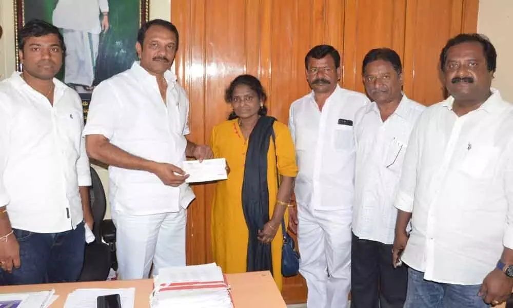 MLA Devireddy Sudheer Reddy hands over CMRF cheque to beneficiary