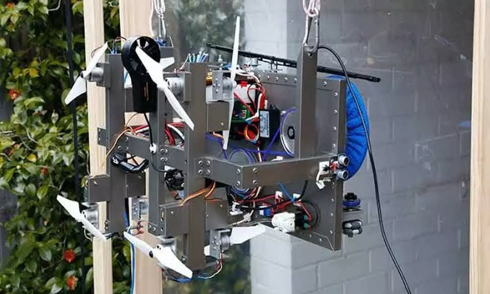 This flying robot can clean glass curtain walls in high-rises