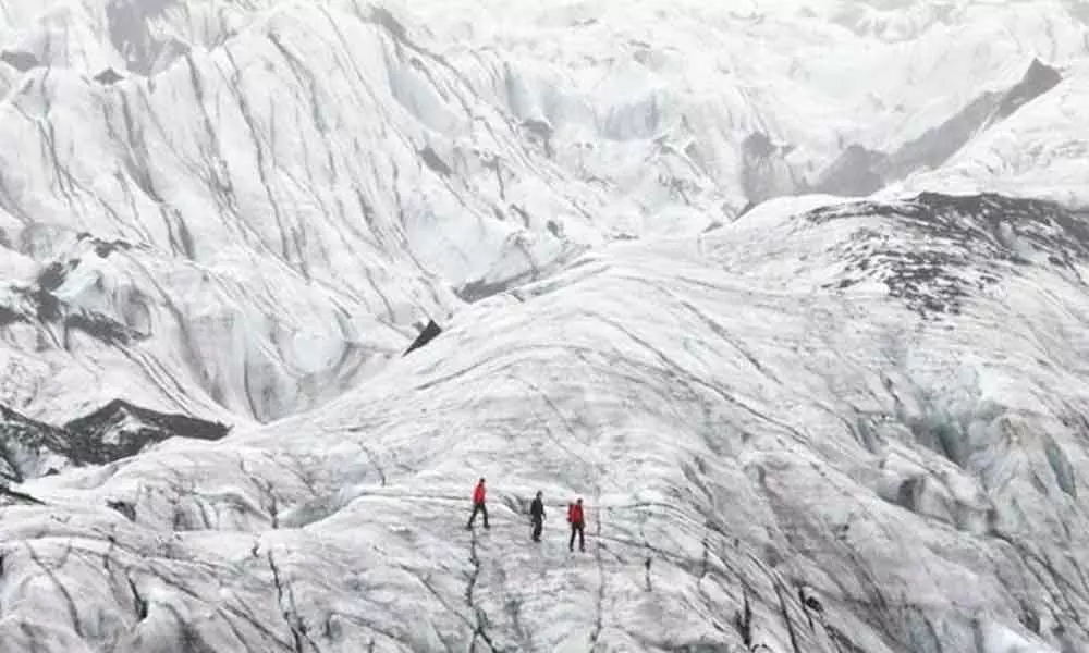 Iceland students see chilling reality of melting glacier