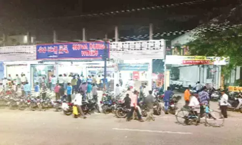 Wine shop near temple sparks protests