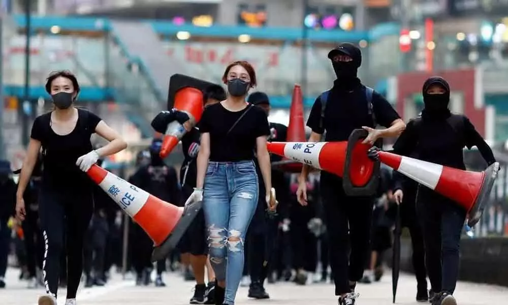 Hong Kong violence reminds China troops close at hand