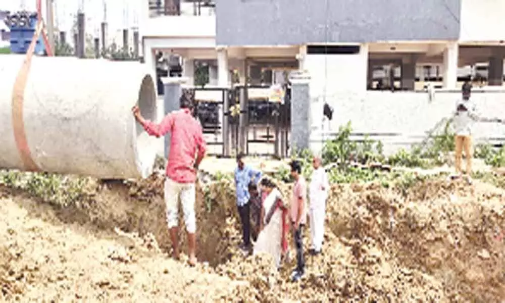 Bobba Navatha inspects drainage works at Chandanagar