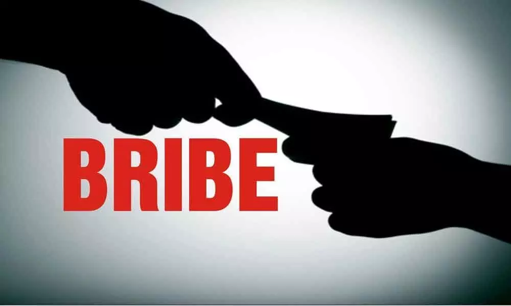 West Godavari: Revenue Inspector caught red-handed for accepting the bribe