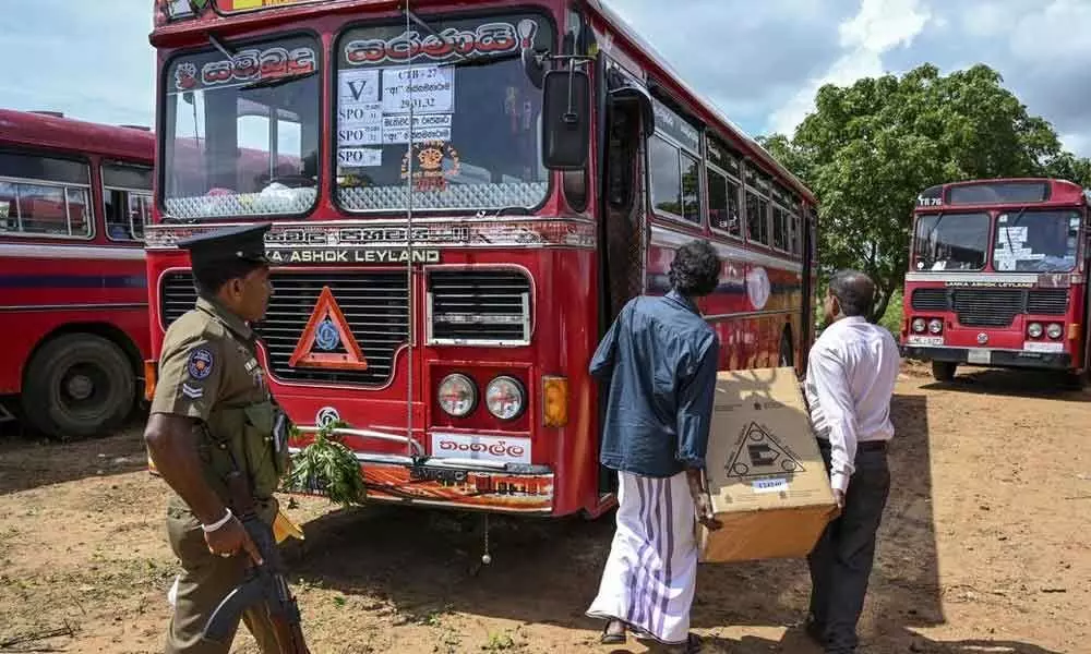 Hours before polling, gunmen fire on buses carrying Muslim Lankan voters