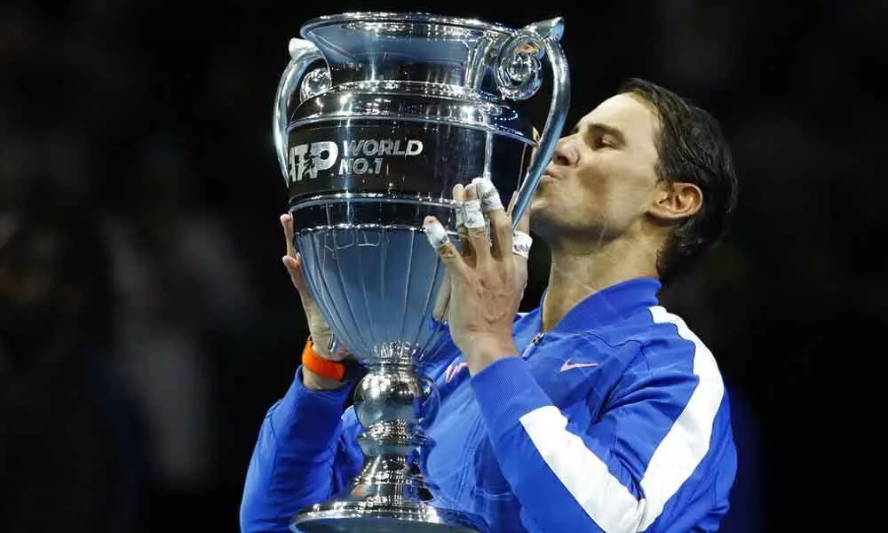 Nadal exits, but stays on top of the world