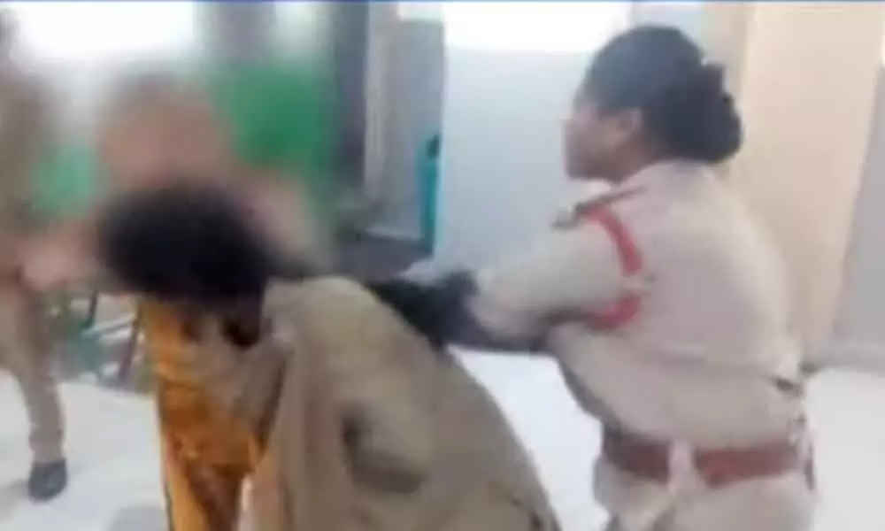 Woman attack cops in Hyderabad