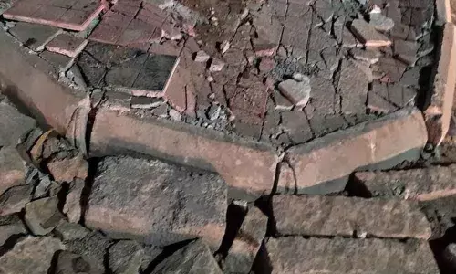 Commuters irked over damaged footpath at Miyapur