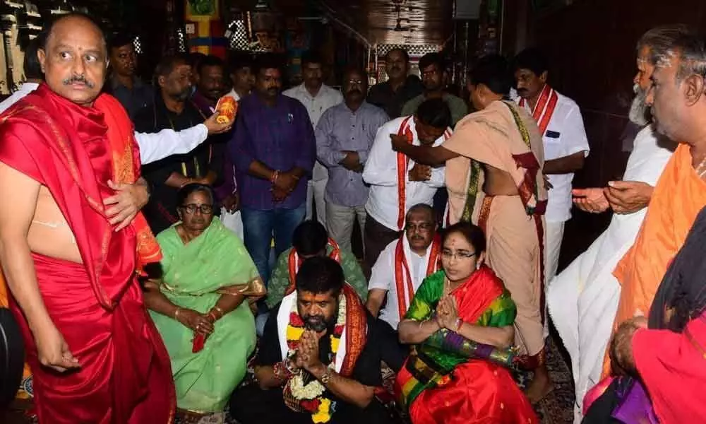 Tourism Minister Muttamsetti Srinivas Rao worships Goddess Durga in Vijayawada