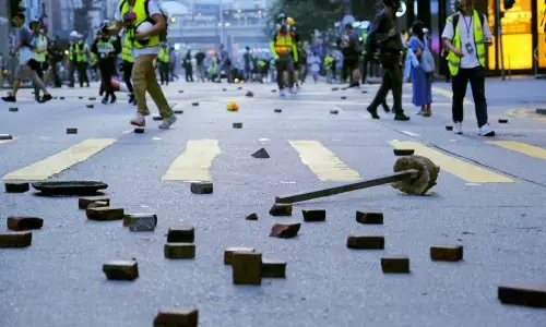 China rejects HK court ruling against anti-mask law