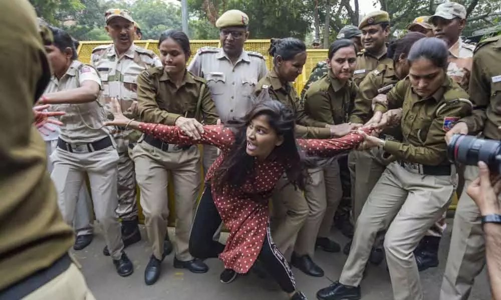 New Delhi: ABVP members protesting JNU hostel fee hike stopped by police