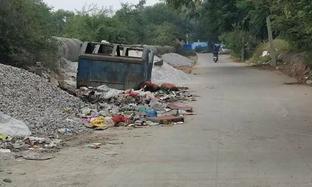 Garbage dumped on road at Chanda Nagar
