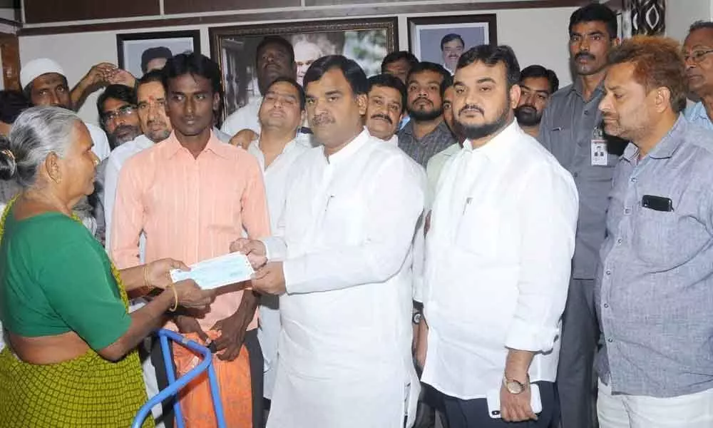 Dy CM Amzath Basha distributes CMRF cheques to beneficiaries in Kadapa