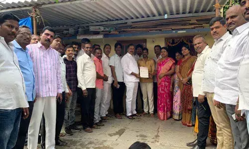 MLA Bethi Subash Reddy hands over CMRF cheque at A S Rao Nagar