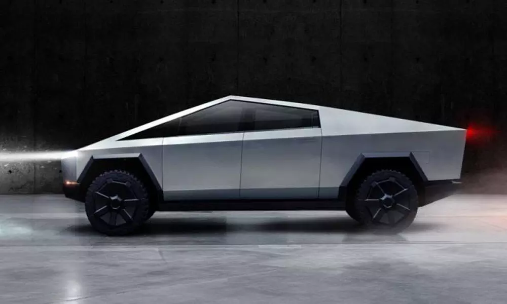 Teslas electric pickup breaks the mould with angular design and armored glass