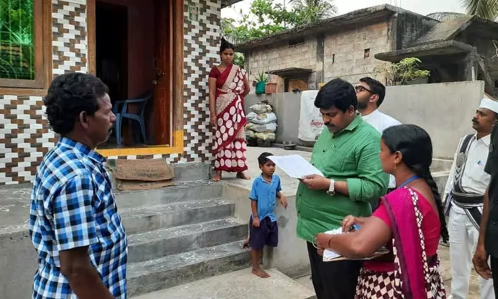 Collector R Muthyala Raju inspects Navasakam data registration process in Bhimavaram