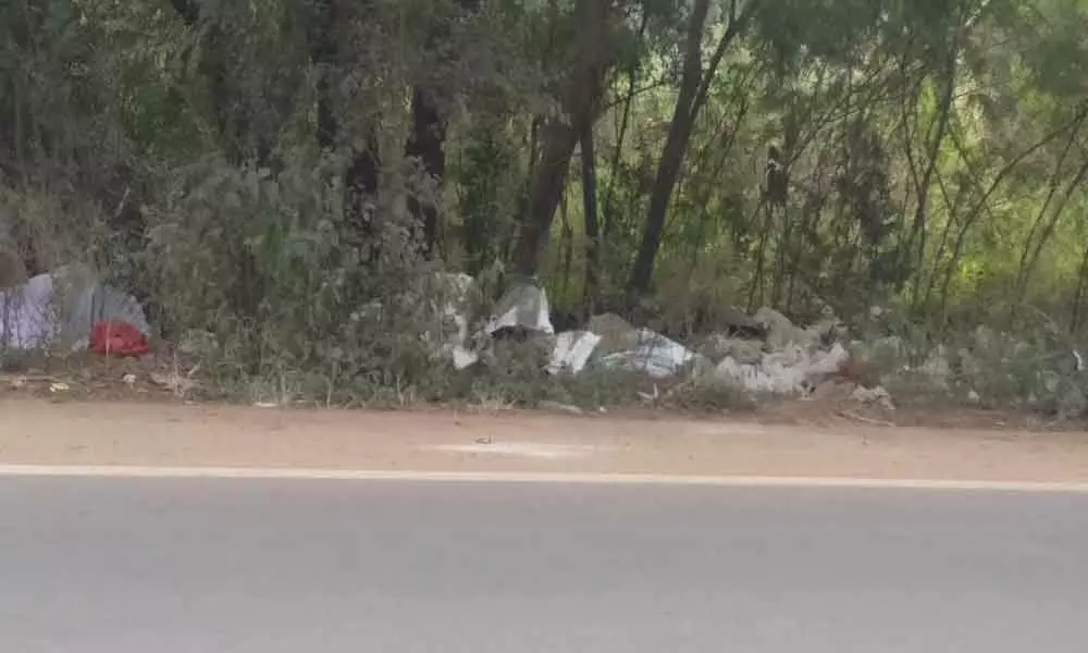Garbage dumped on Kompally Bolaram road