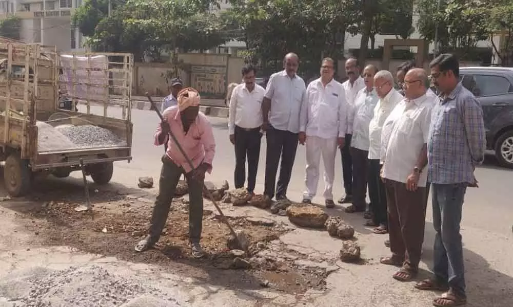 Corporator Janakirama Raju inspects road repairs at Nagarjuna Homes Colony