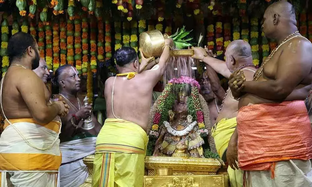 Tirupati: Deity decked up with garlands of dry fruits, roses