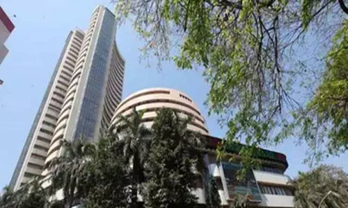 Sensex scales new peak on global cues