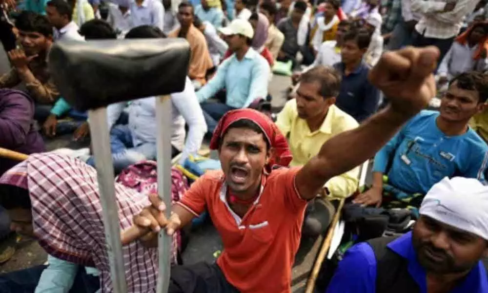 Protest by differently-abled at Mandi House leads to traffic jams in  Delhi