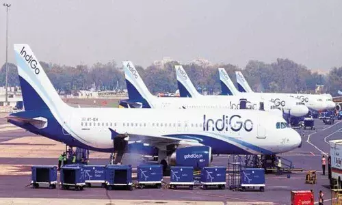 Indigo parent shares close 2% lower
