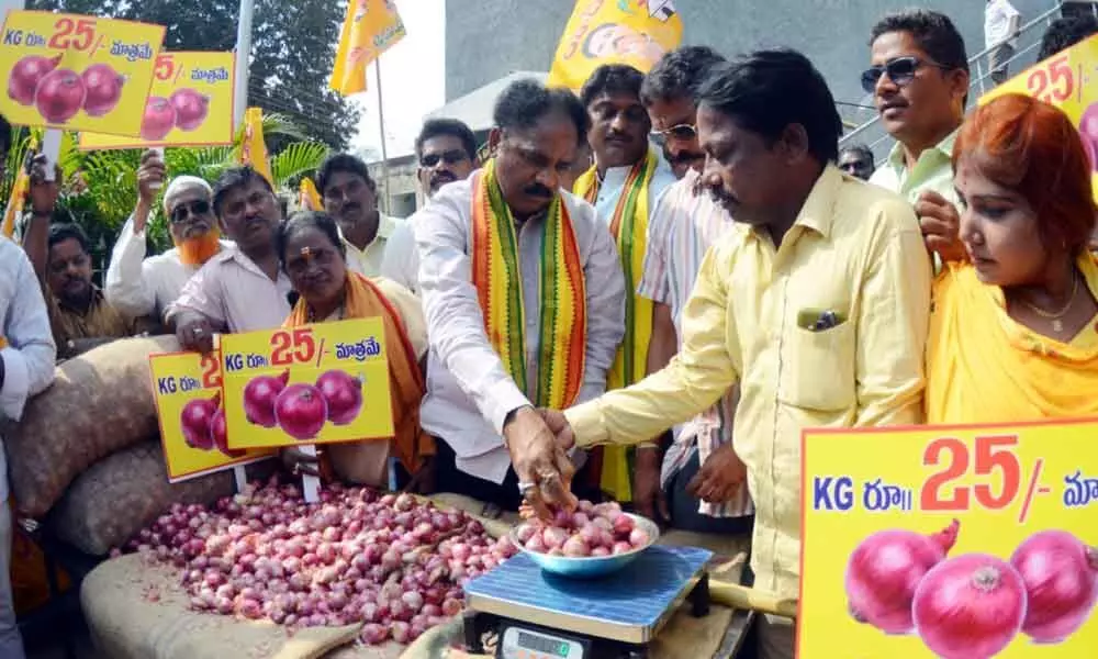 Visakhapatnam: MLA Vasupalli Ganesh Kumar sells onions at subsidy in city
