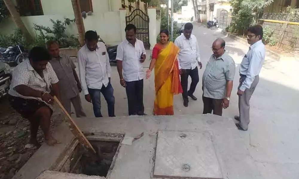 Bobba Navatha Reddy inspects drainage pipeline at Chandanagar