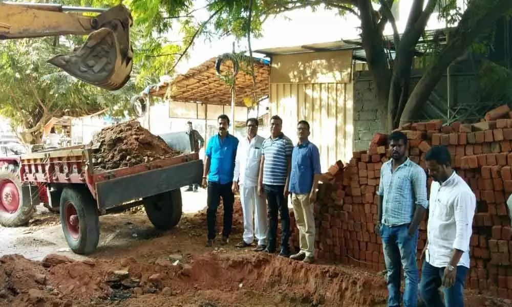 Corporator Janakirama Raju inspects road repairs at Hydernagar division
