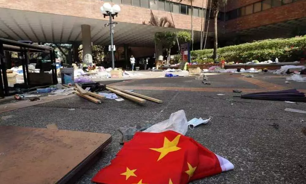 Hong Kong set for fresh protests as police end 12-day university siege