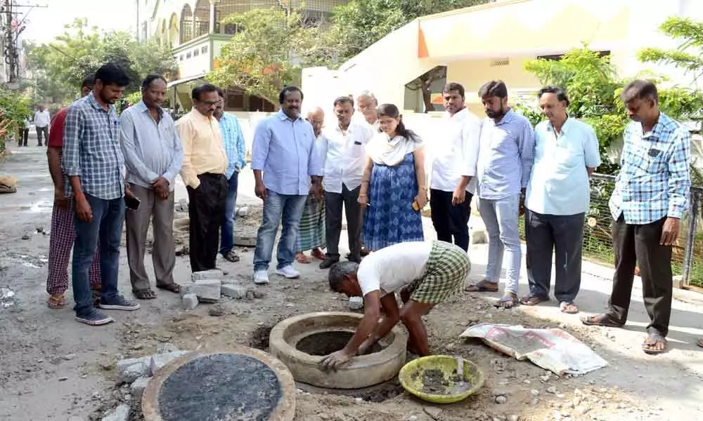 Corporator Mudraboina Srinivasa Rao inspects CC road works at Sai Nagar Colony