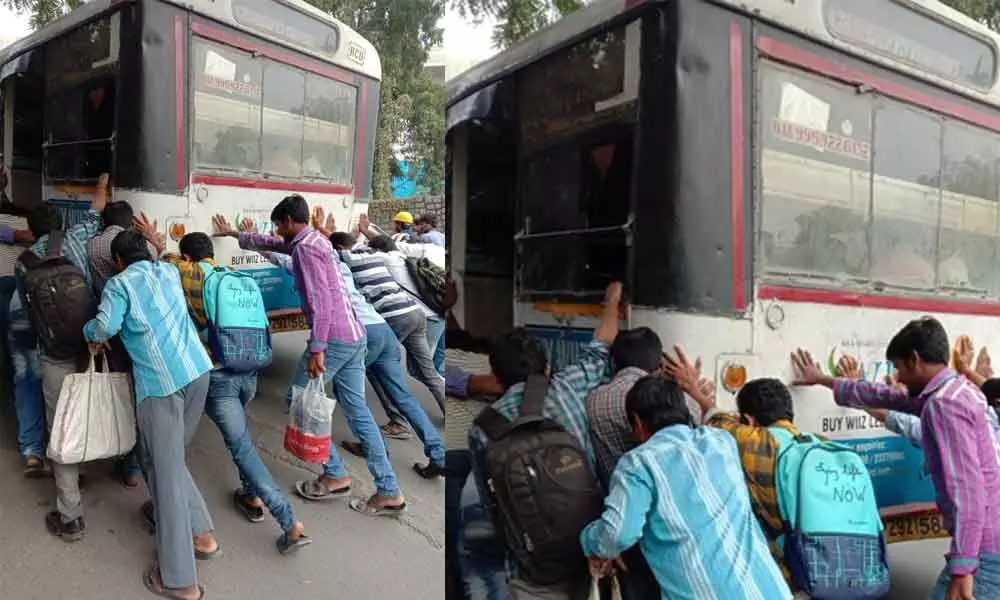 Passengers push RTC bus breaks down