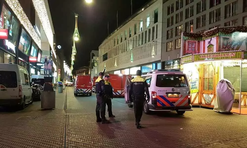Dutch police hunt suspect after three stabbed in The Hague