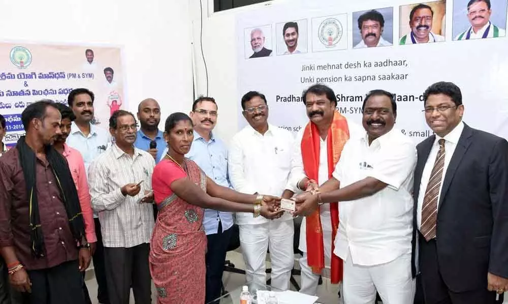 Tirupati: Minister G Jayaram distributes PM-SYM cards to workers