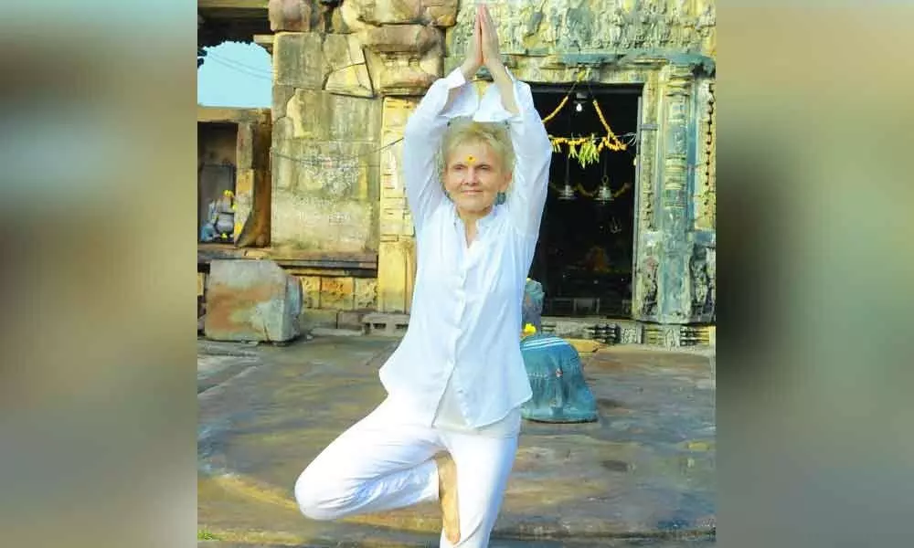 Bhupalpally: Germans practise yoga at Kota Gullu