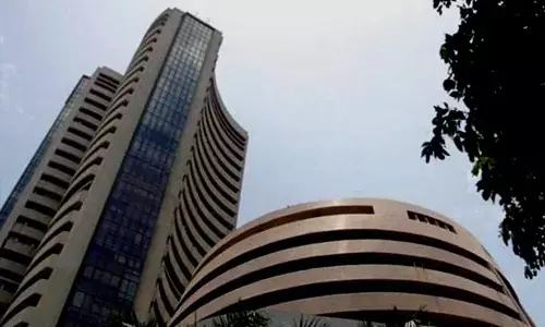 Mid-caps lose nearly 1%, Sensex closes flat