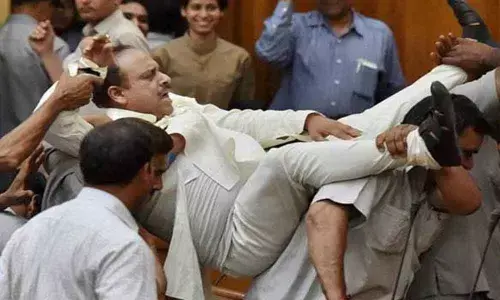 Ruckus in Delhi Assembly, Gupta marshalled out