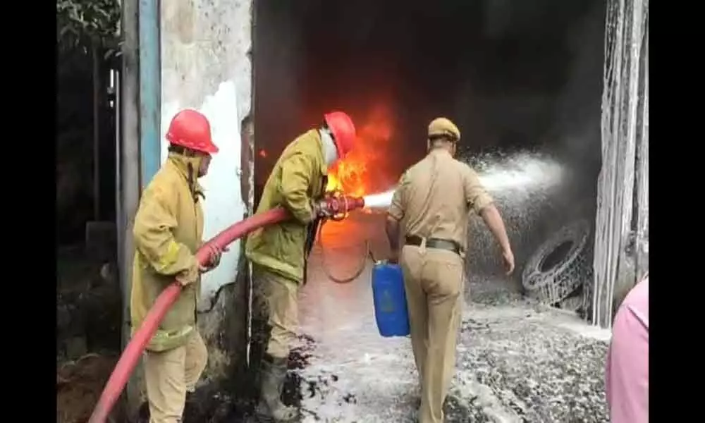 Alert workers prevent spread of fire
