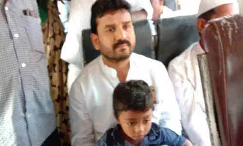 MLA Dr M Anand travels in TSRTC bus