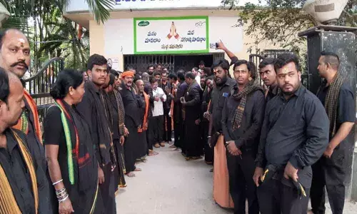 Ayyappa swamis protest as flexis removed at Malkajgiri