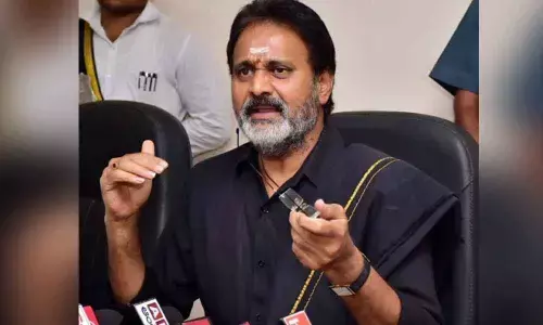 Minister Mopidevi warns stern action against onion hoarders in Kakinada