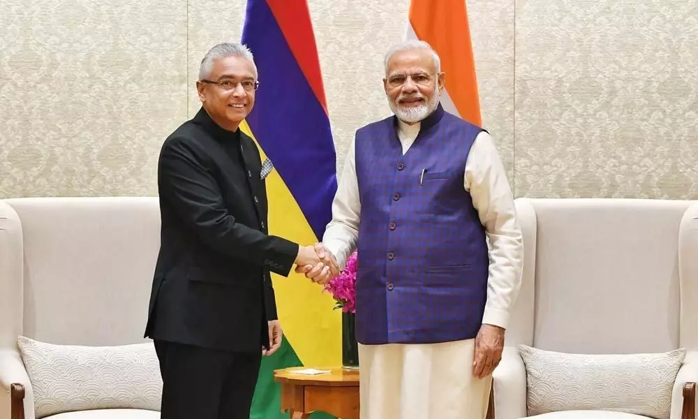 After re-election victory, Mauritius PM meets Modi