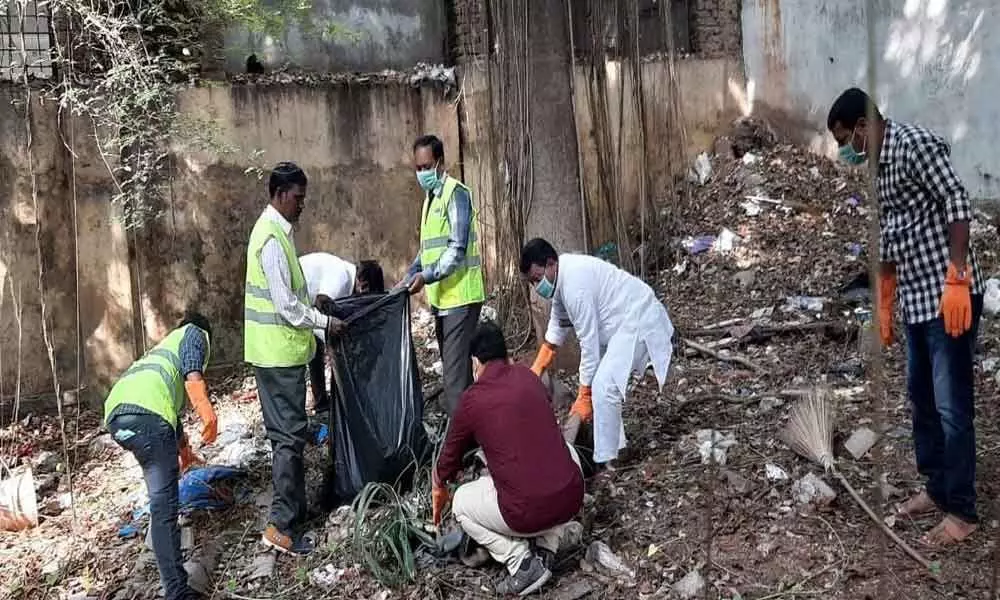 NGO, GHMC clean up PHC & surroundings in Amberpet