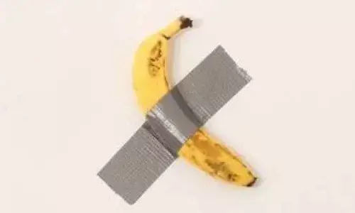Artist puts banana taped on wall on sale for £91,000