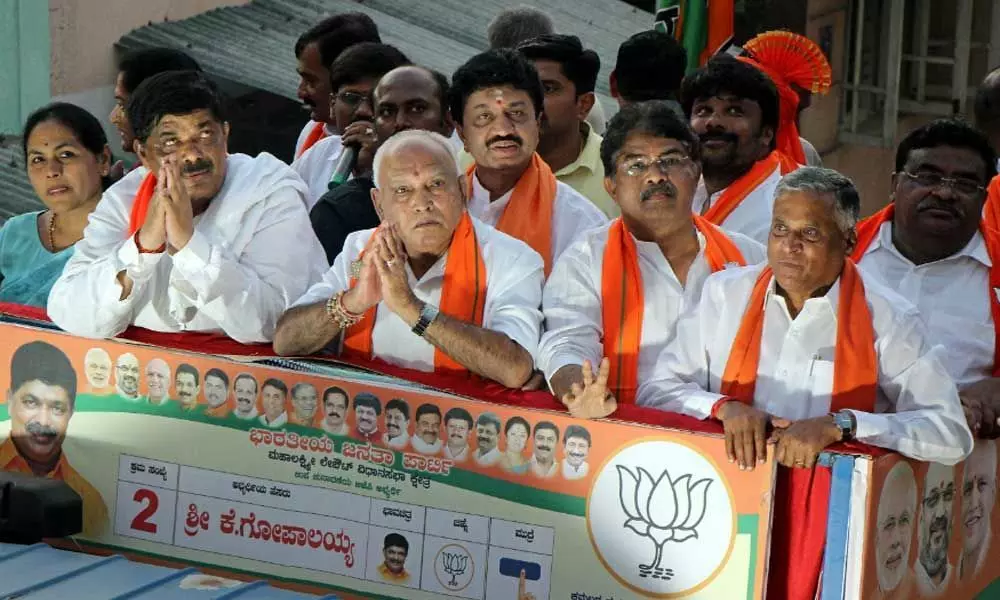 Bypoll trends indicate BJP government to continue in Karnataka