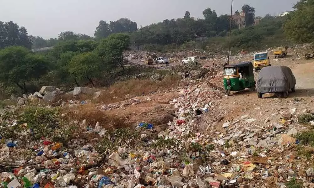 Garbage dumped on road at Bowenpally