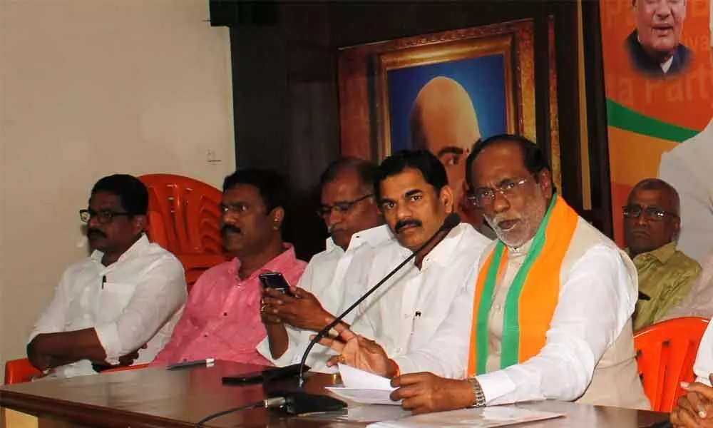 BJP slams KCR for pushing State into debt trap