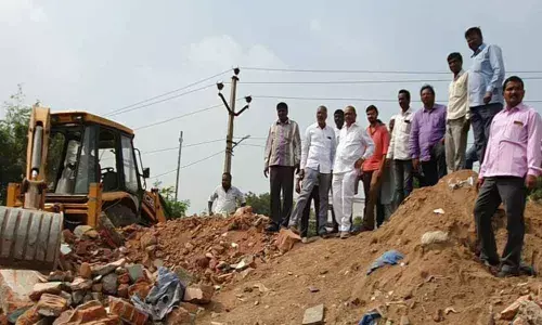 Corporator Dodla Venkatesh Goud supervises graveyard works