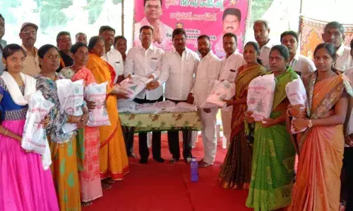MLA Kaleru Venkatesh distributes Christmas gifts