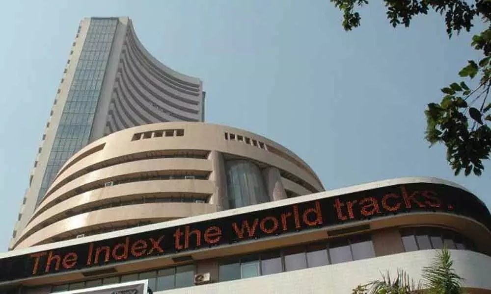 Sensex tumbles over 100 points; Nifty tests 12,250