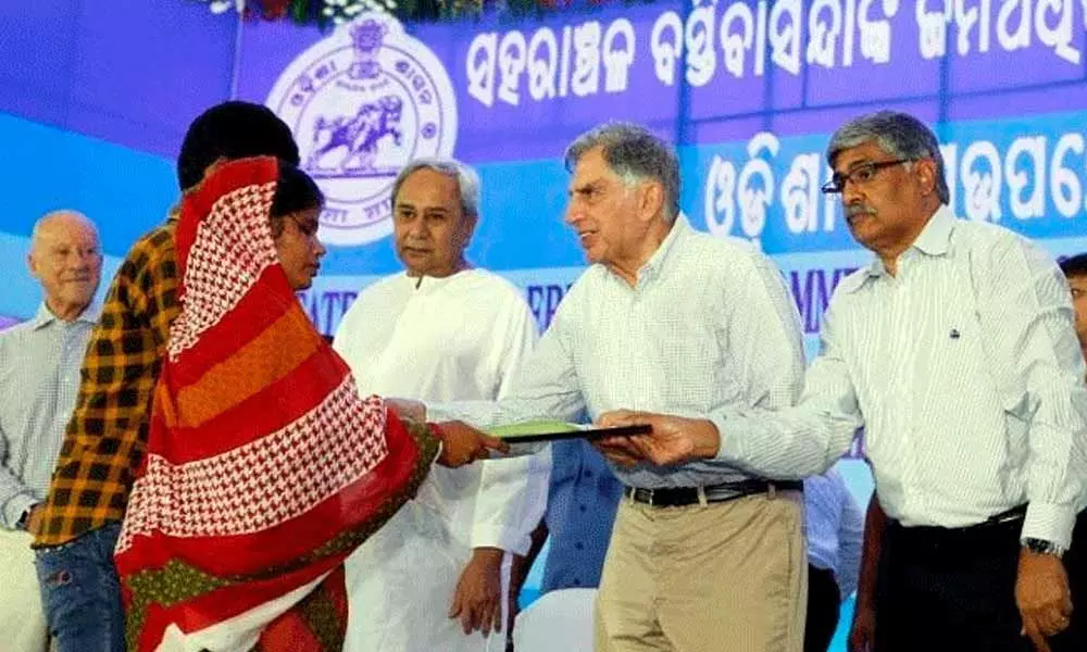 Ratan Tata gives out land rights to slum dwellers in Odisha